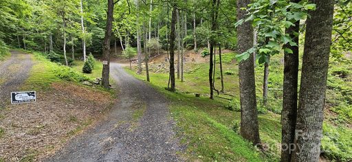 264 Quiet Times Drive sold home in The Woods, Burnsville, NC