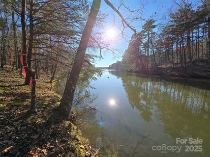0 Whisper Lake Drive sold lot in Heron Bay, Badin Lake, NC