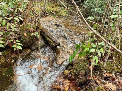 Lot 64 Peppervine Circle active lot in Round Mountain Falls, Rosman, NC
