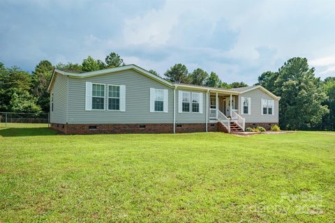 6785 Knotty Wood Lane sold home in Cedar Grove Heights, Vale, NC