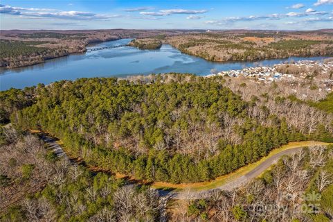 642 Whisper Lake Drive active lot in Heron Bay, New London, NC