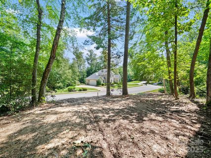 99999 Mistletoe Trail active lot in Creekside, Hendersonville, NC