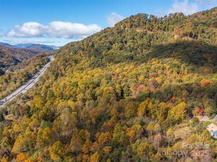 9999 Lovebird Lane active land listing in Ashebrook Estates, Candler, NC