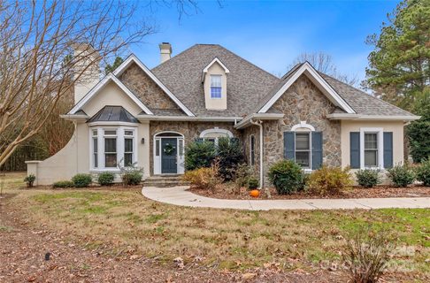 108 Candor Oaks Drive active home in Uwharrie Point, New London, NC