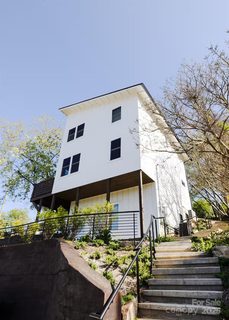 1057 Riverside Drive active home in Woodfin Land Company, Asheville, NC