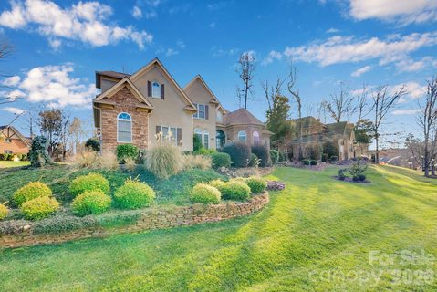 7778 Burning Ridge Drive active home in Treetops At Cowans Ford, Stanley, NC