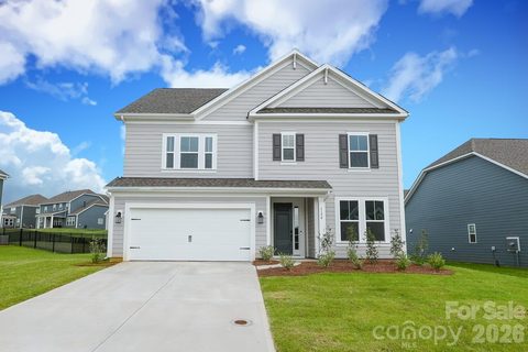 A home in The Estates At Sugar Creek