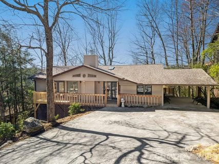 416 Kanasgowa Drive active home in Connestee Falls, Brevard, NC