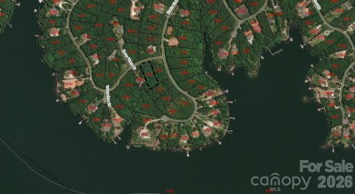 125 Whisper Lake Drive active lot in Heron Bay, New London, NC