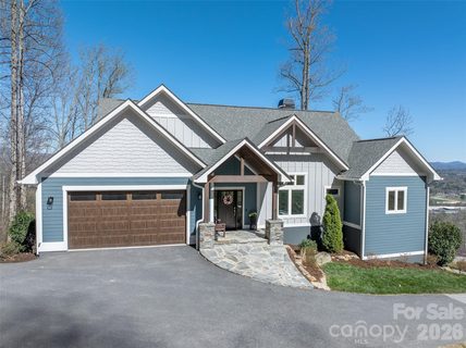 98 Rock Cliff Way active home in The Boulders, Hendersonville, NC