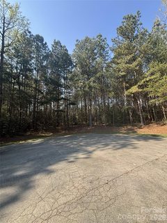 123 Summerlake Drive active lot in Heron Bay, New London, NC