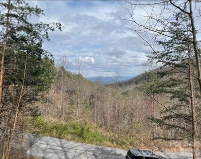 92 Mountain Magnolia Drive sold lot in Moores Valley, Leicester, NC