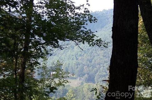 100 Black Bear Ridge Trail active home in Rock Creek, Zirconia, NC