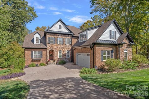 7809 Oak Haven Lane active home in Treetops At Cowans Ford, Stanley, NC