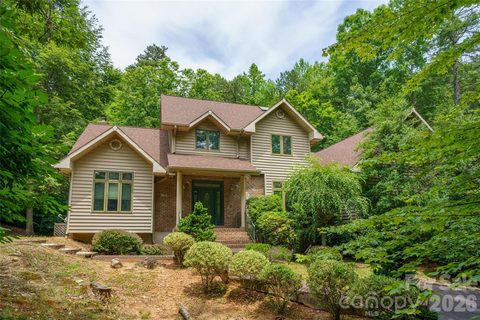 136 Rumbling Bald Road active home in Rumbling Bald On Lake Lure, Lake Lure, NC