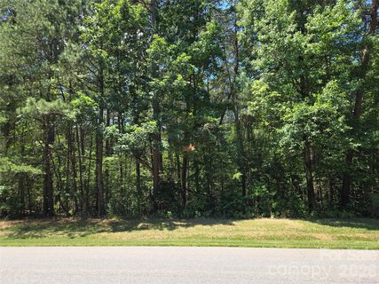 145 Badin View Drive active lot in Heron Bay, Badin Lake, NC