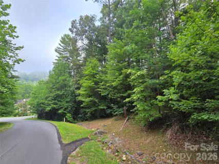 16 Courseview Drive active lot in Reems Creek Golf Community, Weaverville, NC