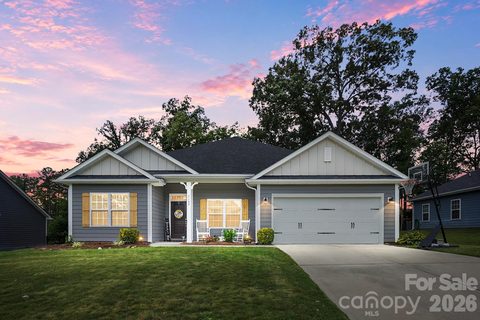 7166 Barleywood Drive active home in The Villages At Red Bridge, Locust, NC