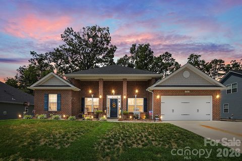 7162 Barleywood Drive active home in The Villages At Red Bridge, Locust, NC