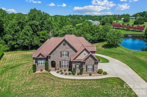 5895 Bakers Point active home in Howards Reach At Bakers Mountain, Hickory, NC