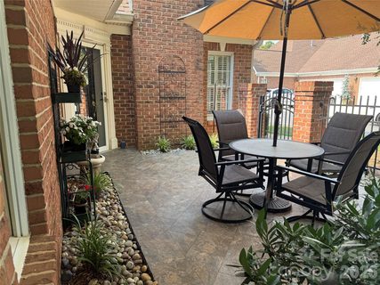 7424 Hurstbourne Green Drive active condo in Piper Glen, Charlotte, NC