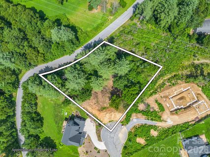 50 Erin Glen Court active lot in The Crossings At Cane Creek, Fairview, NC