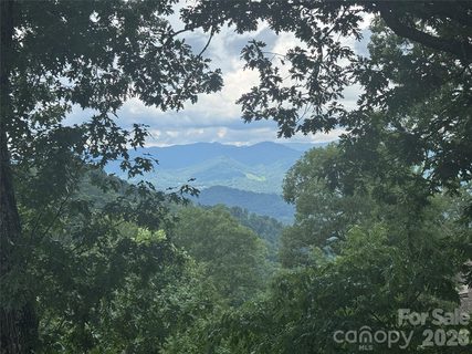 10 Stoney Falls Loop active home in Mountain Air, Burnsville, NC