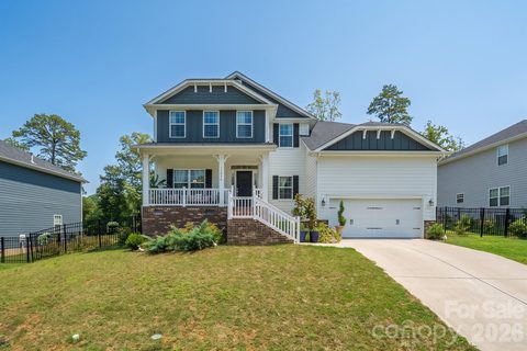 11836 Glenwood Drive active home in The Villages At Red Bridge, Locust, NC