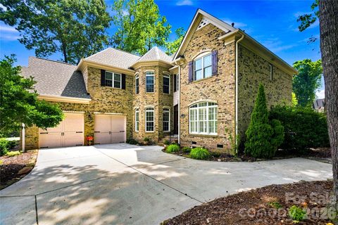 7768 Burning Ridge Drive active home in Treetops At Cowans Ford, Stanley, NC