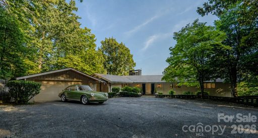 1225 Hogback Mountain Road active home in Gillette Woods, Tryon, NC