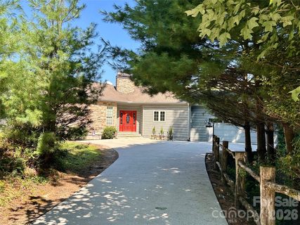 1228 Ugugu Drive active home in Connestee Falls, Brevard, NC