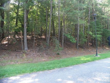 328 Whisper Lake Drive active lot in Heron Bay, New London, NC
