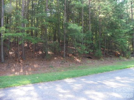 344 Whisper Lake Drive active lot in Heron Bay, New London, NC