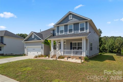 11732 Glenwood Drive active home in The Villages At Red Bridge, Locust, NC