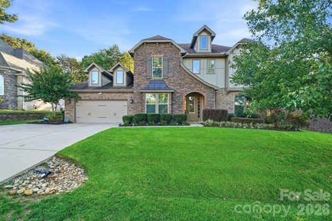 7810 Sand Trap Lane active home in Treetops At Cowans Ford, Stanley, NC