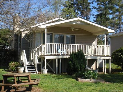 752 Pinehaven Drive 105 & (In Front of) sold home in Pinehaven, Badin Lake, NC