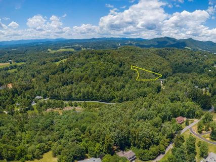 Lot 40 Quail Ridge Road sold lot in Woodhaven, Mars Hill, NC