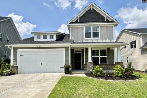 125 Magnolia Petal Drive active home in The Cottages At Woodcreek, Elgin, SC